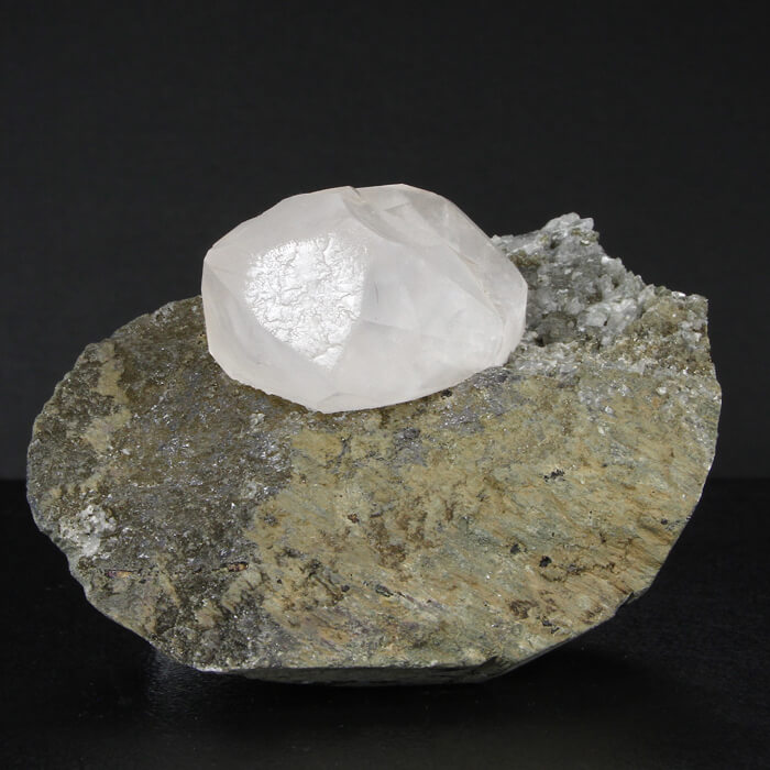 Fluorescent Calcite Crystal on Matrix