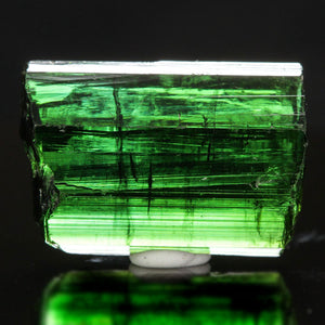 Raw green tourmaline crystal gemmy