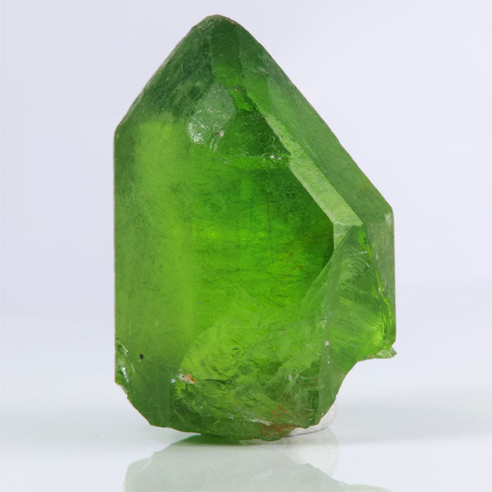 Deep green raw peridot crystal rough specimen