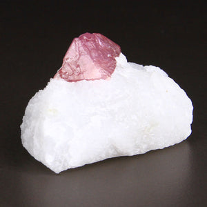35g Pink Spinel Crystal on Marble