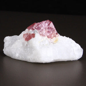 35g Pink Spinel Crystal on Marble