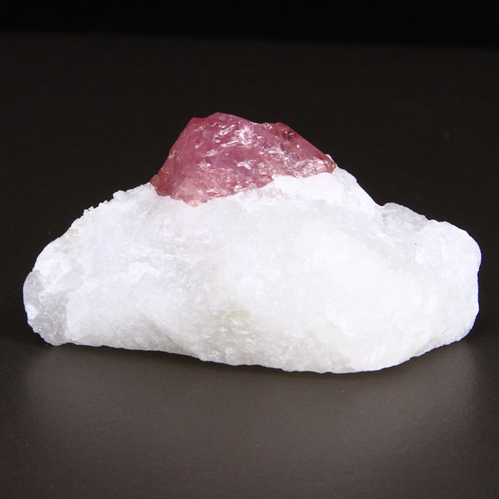 35g Pink Spinel Crystal on Marble