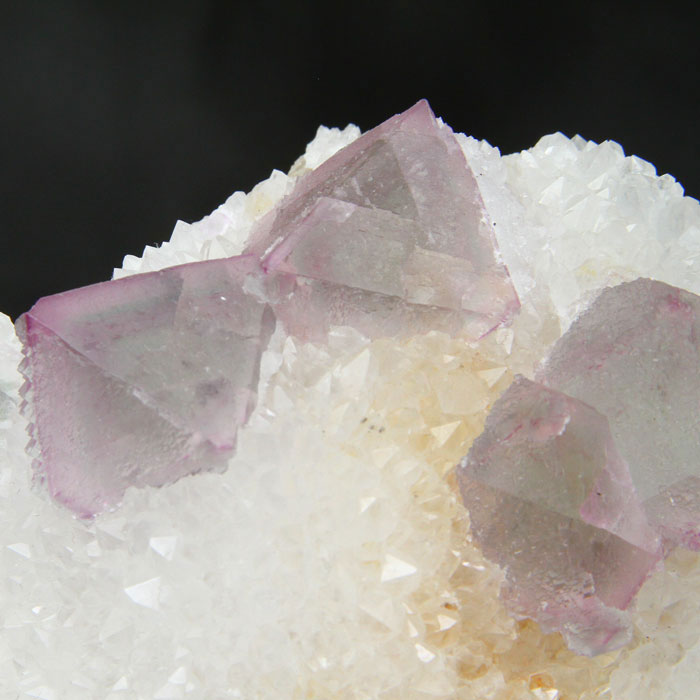 Purple Fluorite octahedrons on quartz from China