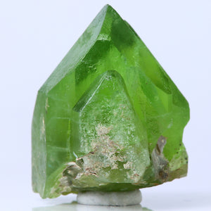 Gemmy green peridot crystal specimen