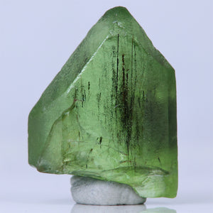 Peridot crystal included with ludwigite