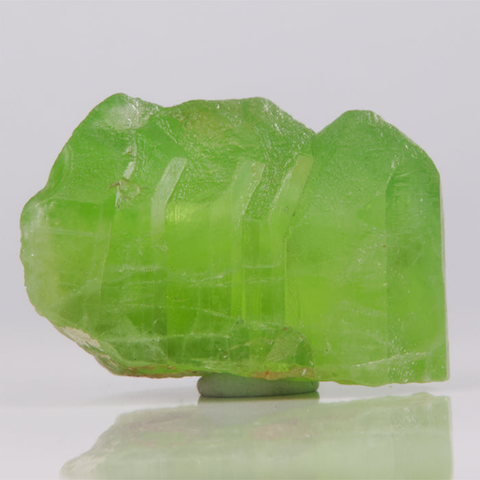 Natural raw peridot crystal mineral specimen