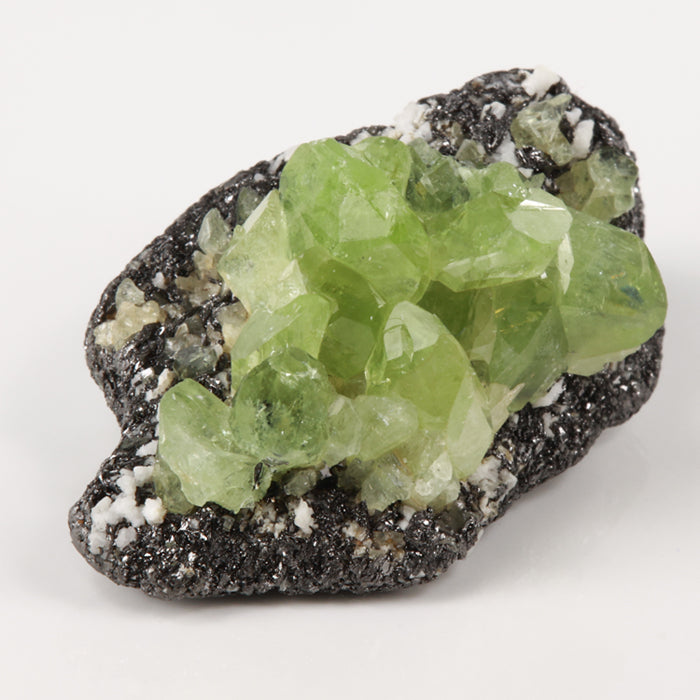 green diopside crystal cluster on matrix