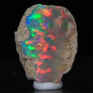 dark base black ethiopian opal mineral specimen crystal