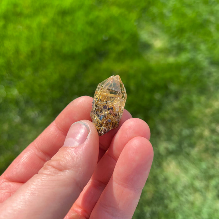 51.1ct Quartz Crystal Filled with Golden Rutile