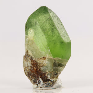 Raw green peridot crystal mineral specimen