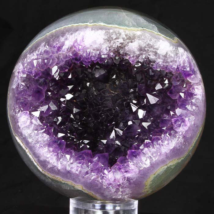 Polished amethyst sphere raw crystal